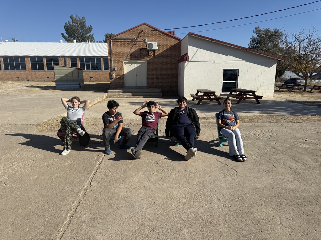 students with chairs