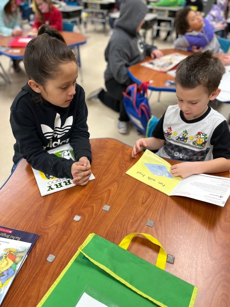 Read Across Douglas in our hoods today! Our WHOLE school buddied up and read today…Go Tigers!