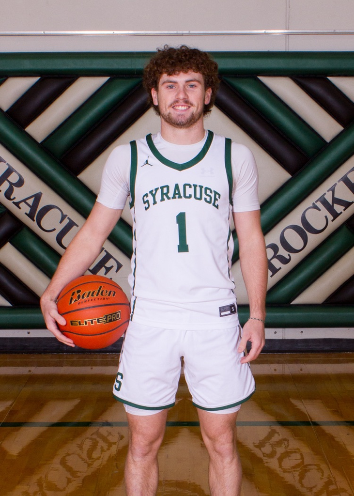 boy standing with basketball