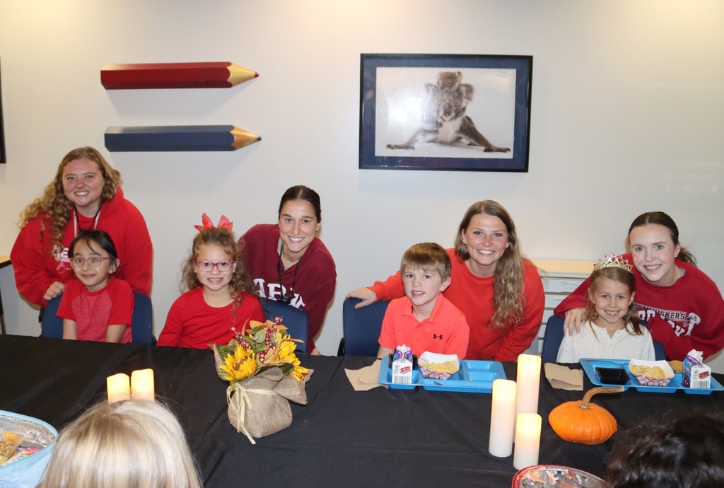 Students and teachers celebrating