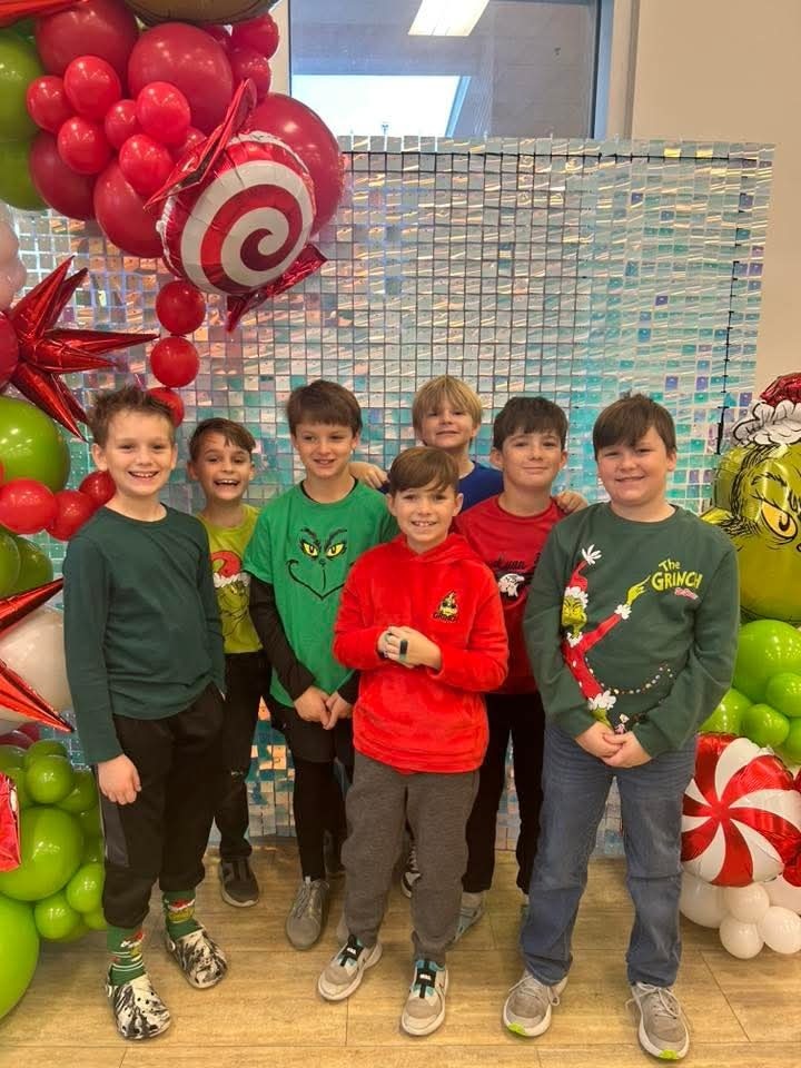 students pose for a holiday photo