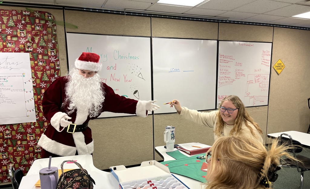 JAG Santa Handing Out Candy Canes