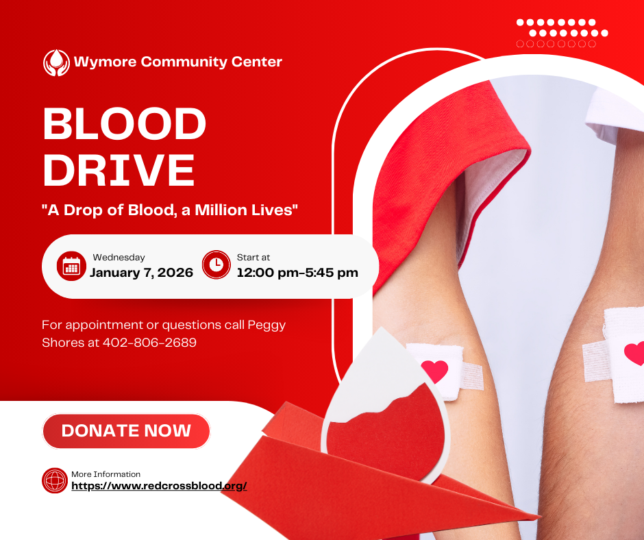 Red and white graphic promoting a blood drive hosted by the Wymore Community Center. The image shows two arms with bandages after donating blood, heart icons, and text listing the date Wednesday, January 7, 2026, from 12:00–5:45 p.m., with contact information and a “Donate Now” call to action.