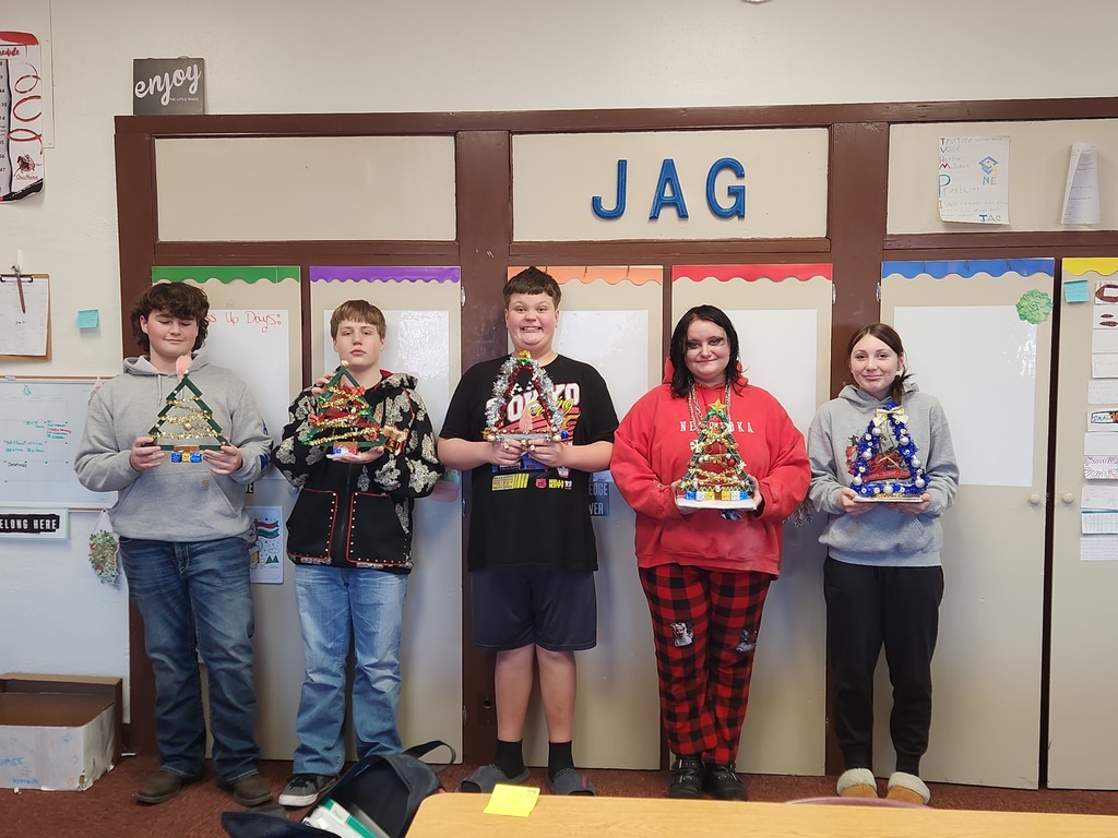 JAG students showing off their creations.