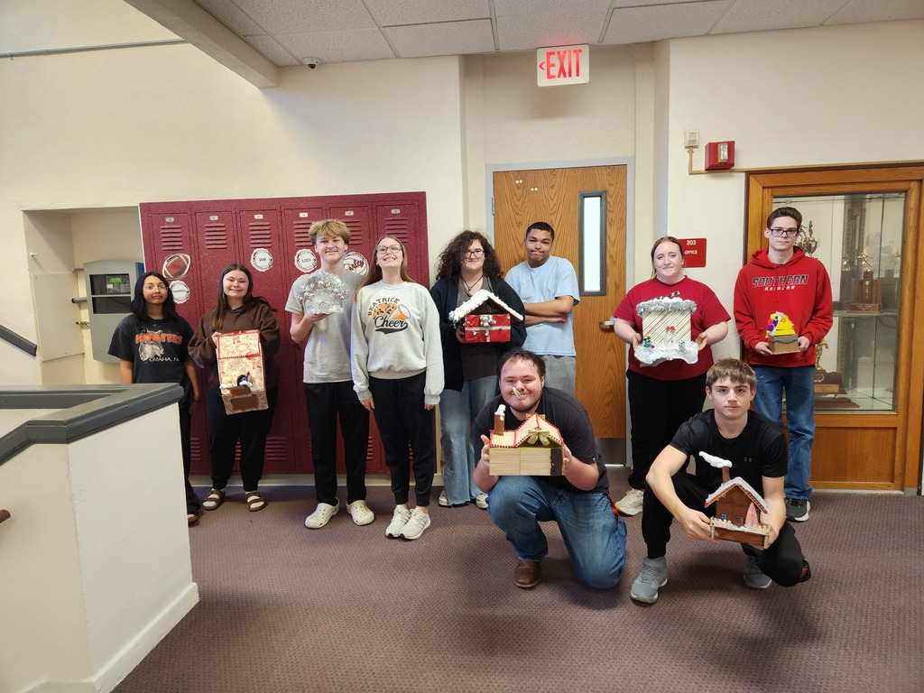 JAG students showing off their creations.