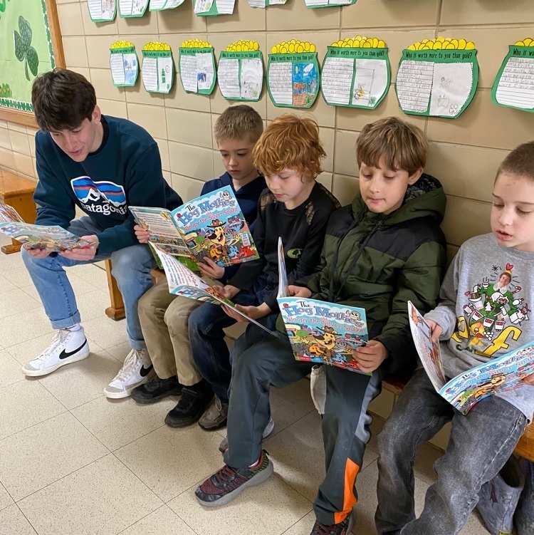 HS students reading to kids
