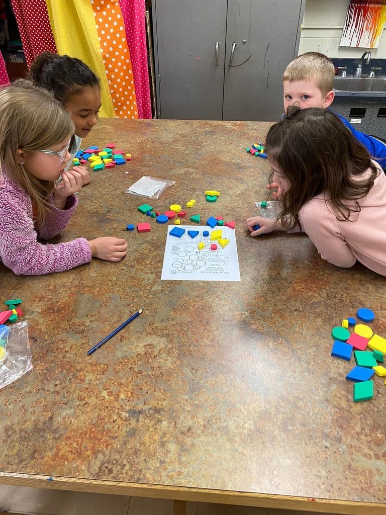 1st graders using attribute blocks