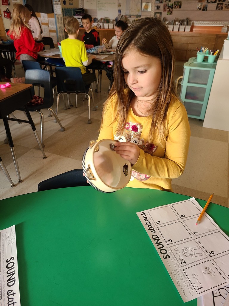 first graders playing with music