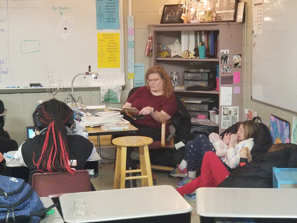 Teacher reading to students