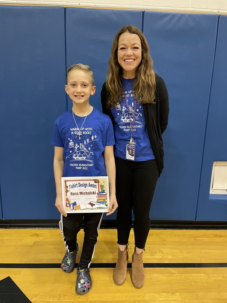 Student and principal stand holding a certificate
