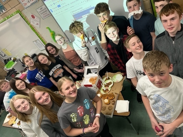 Students show off their Pi Day treats.