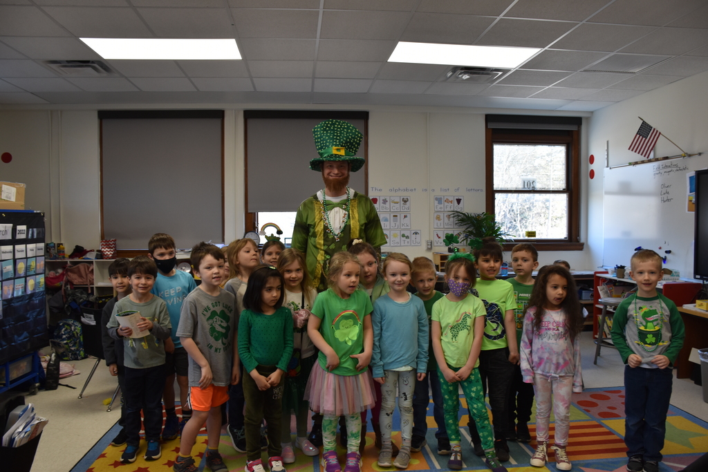 class photo with leprechaun 