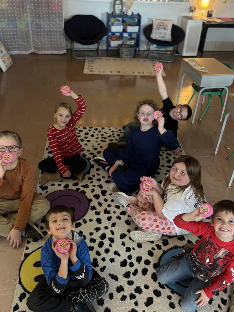 1st grade holding up bubble gum