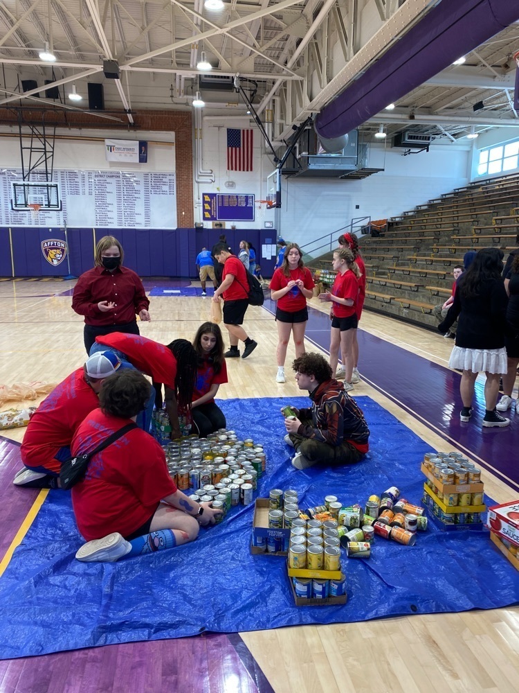 Freshmen working on their can sculpture.