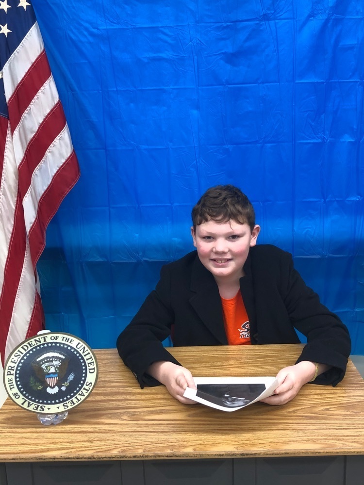 student dressed like president