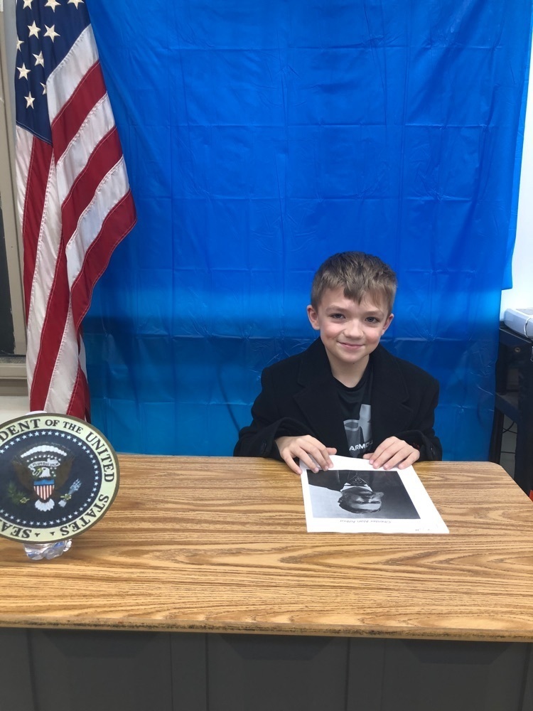 student dressed like president