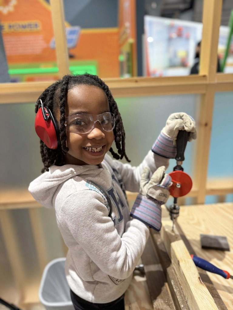 Young boy playing and smiling. 