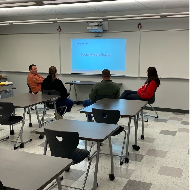parents meeting with a teacher 