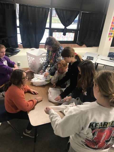 Folding for the food pantry!