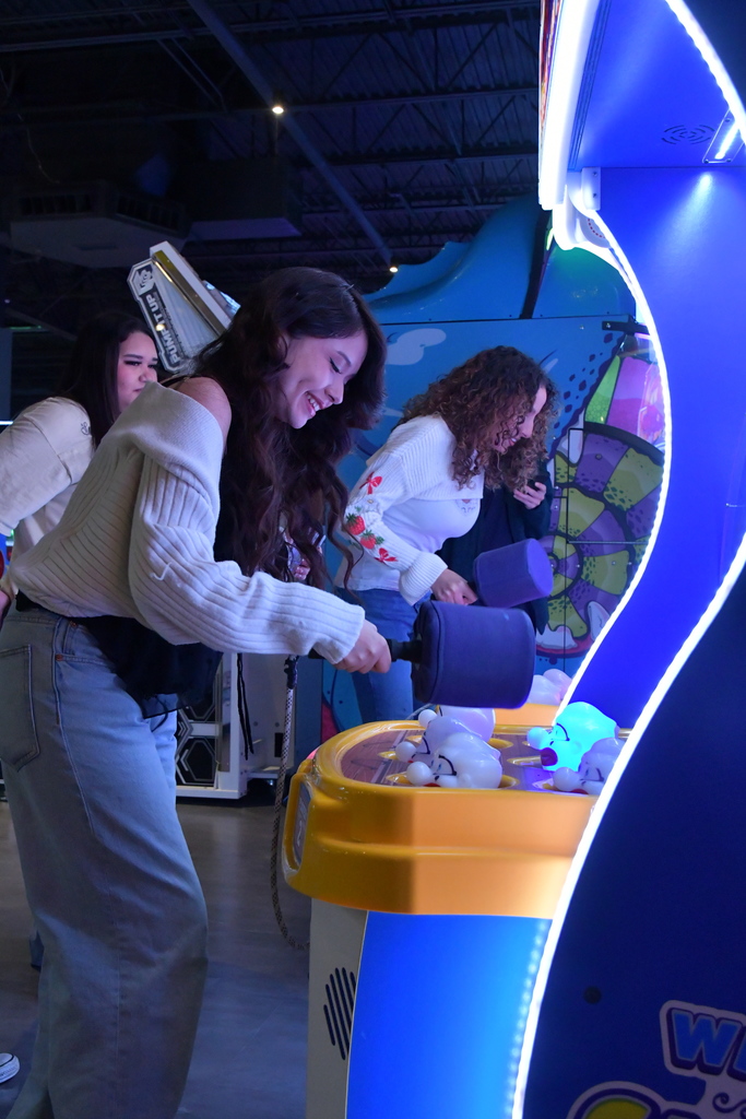 students playing whack a mole