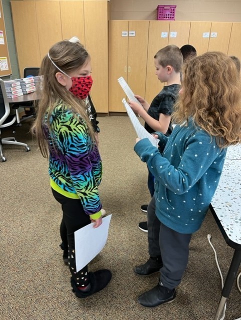 Students working together on an editing activity.