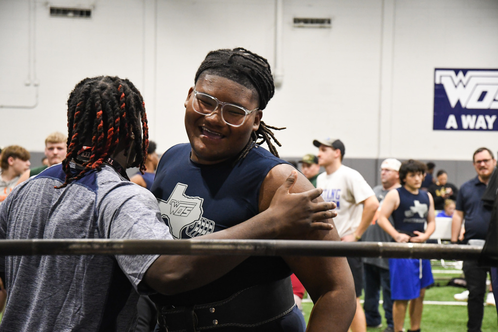 boys powerlifting squat celebration