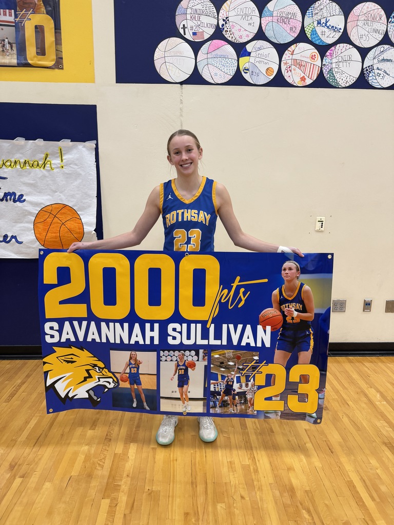 Savannah with her posters of 2000 pts. 