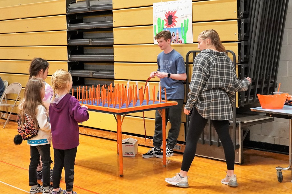 students playing ring toss