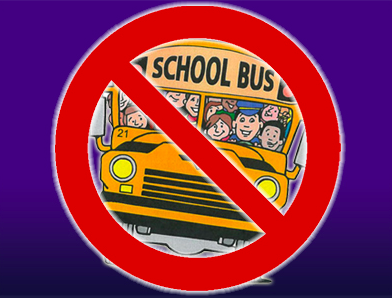 School bus with cancelled sign over it.