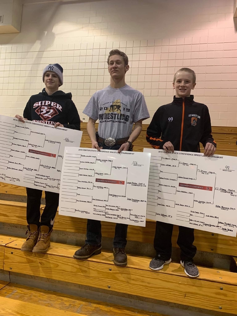 Avery Leonard, Logan Kantor, and TJ O'Connor pictured with winning placards.