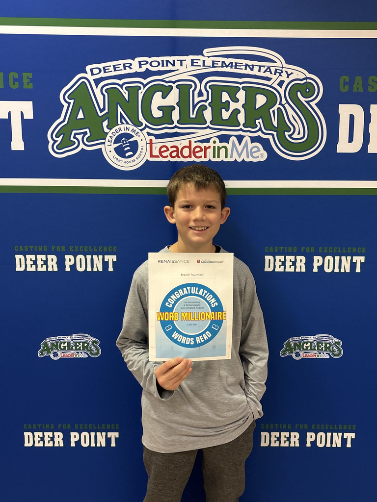 Student poses with certificate