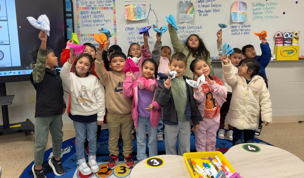 Student showing Their unique paper kites