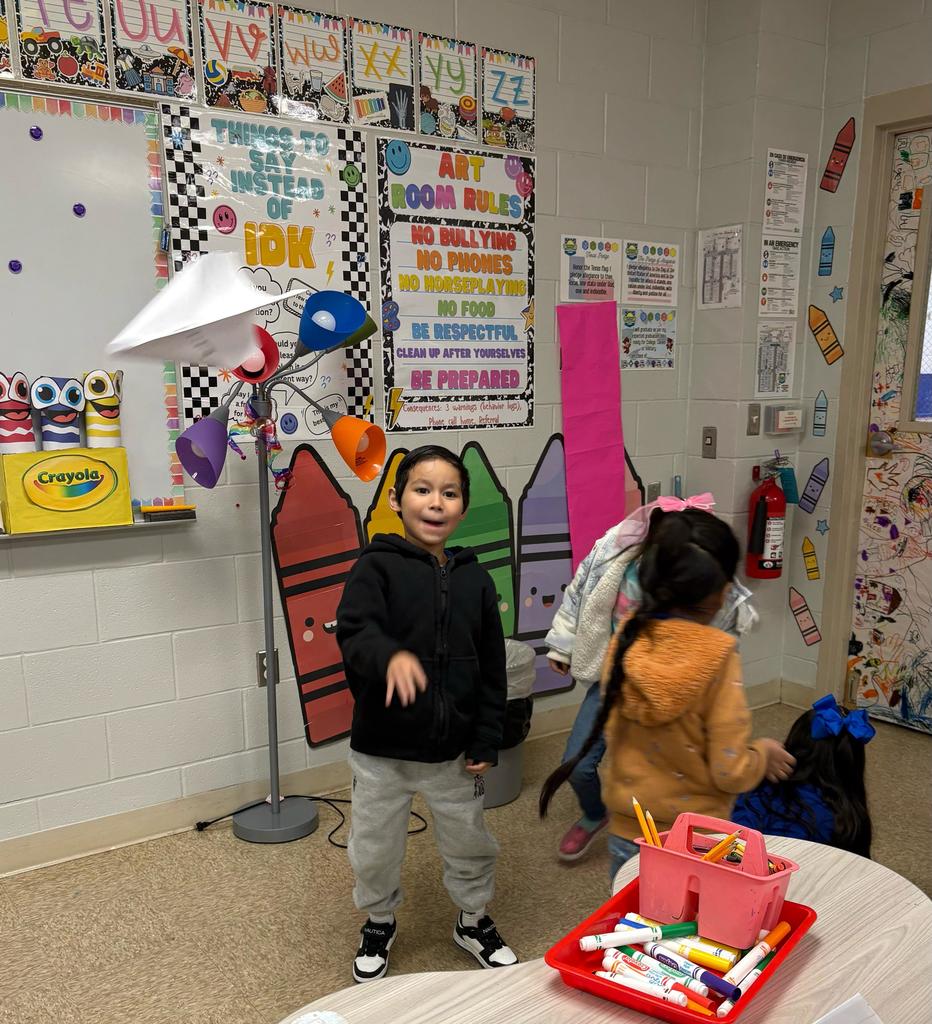 Students flying unique paper kites