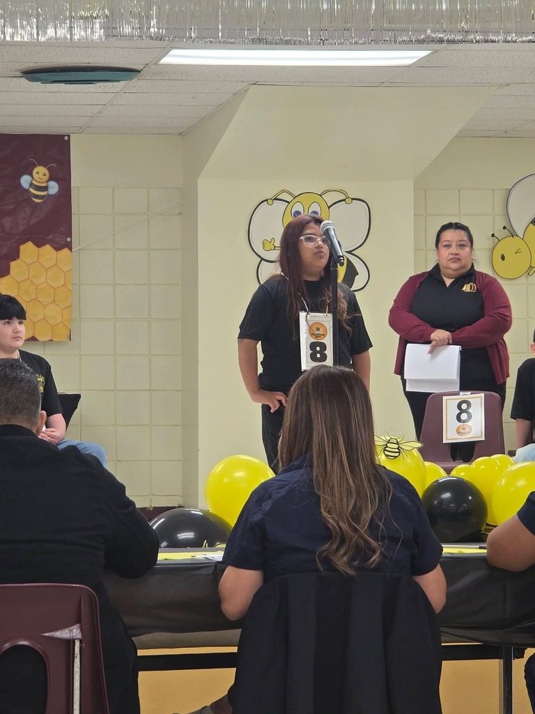 students speaking into microphone