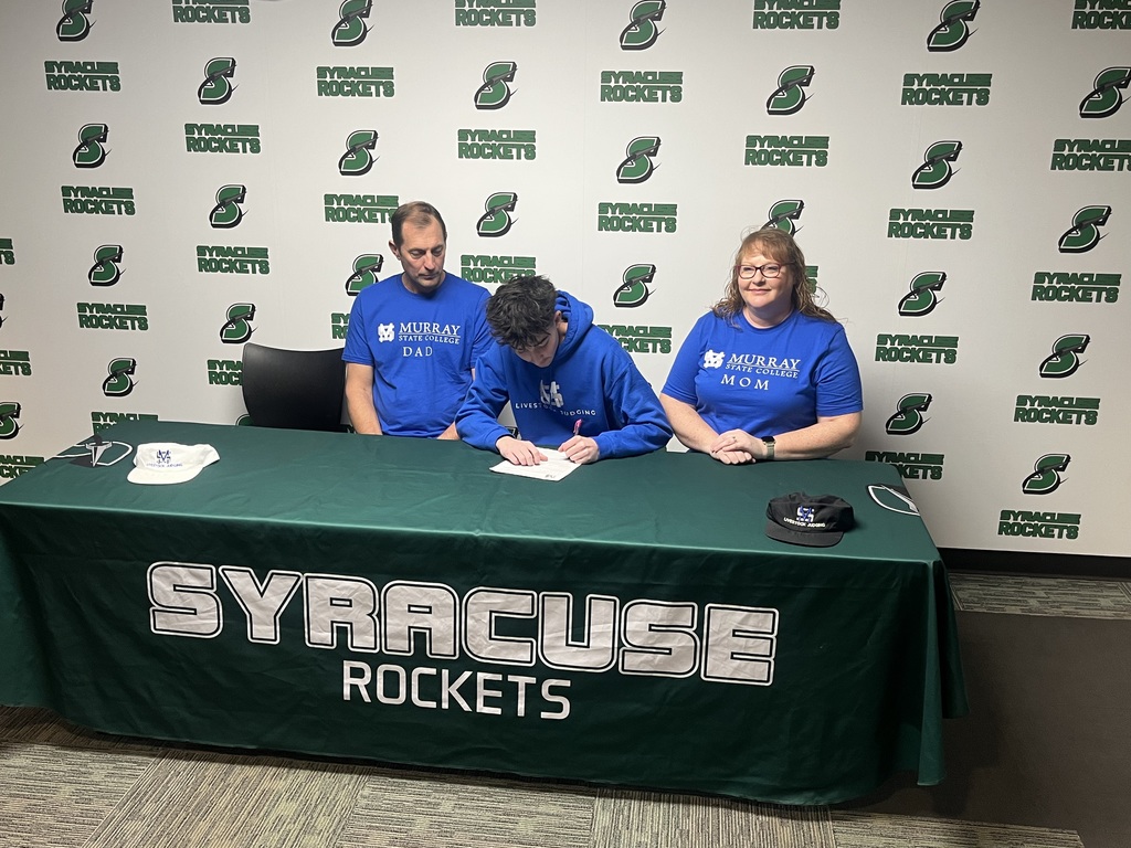 Diego Velazco signing at Murray State College for livestock judging.