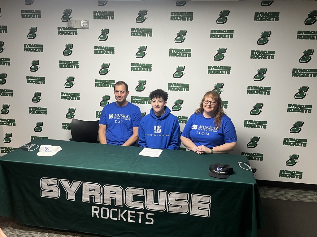 Diego Velazco signing at Murray State College for livestock judging.