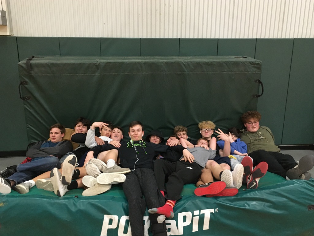 High School Boys relaxing on the high jump matts?