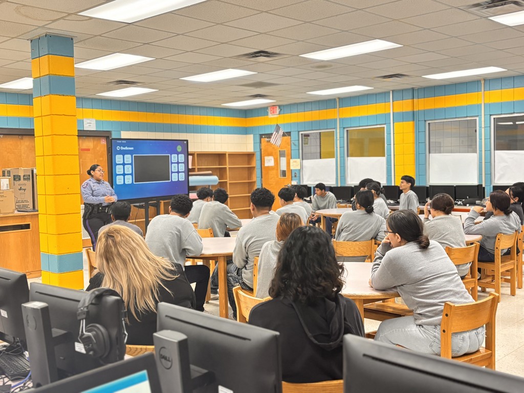 Police Officer presenting to students