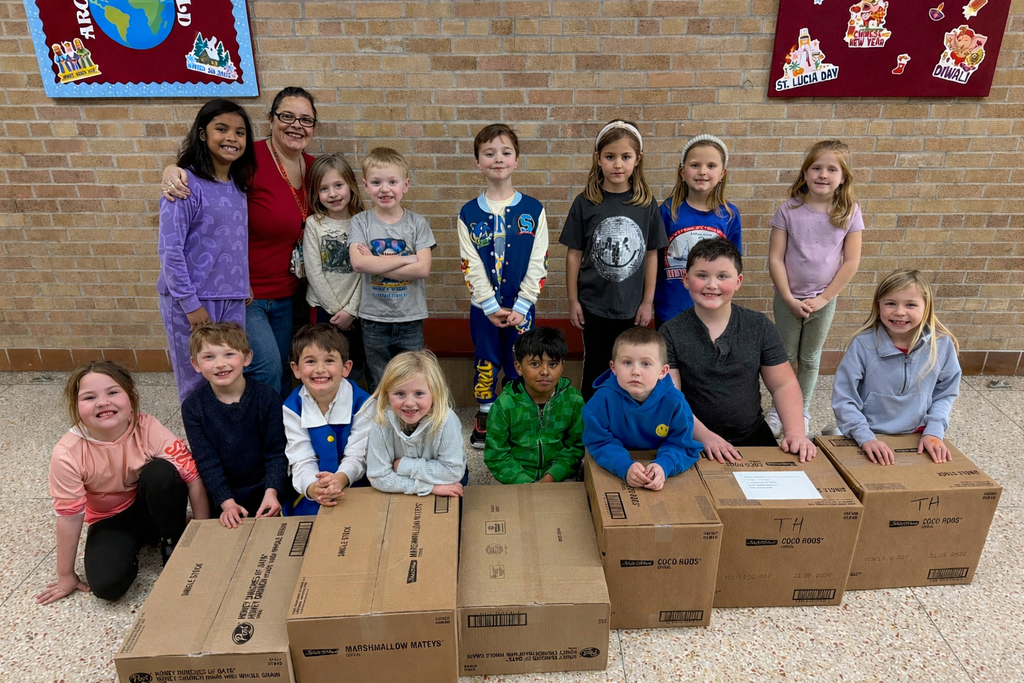 Mrs. Stevenson and students with cereal donated by Post, Inc.