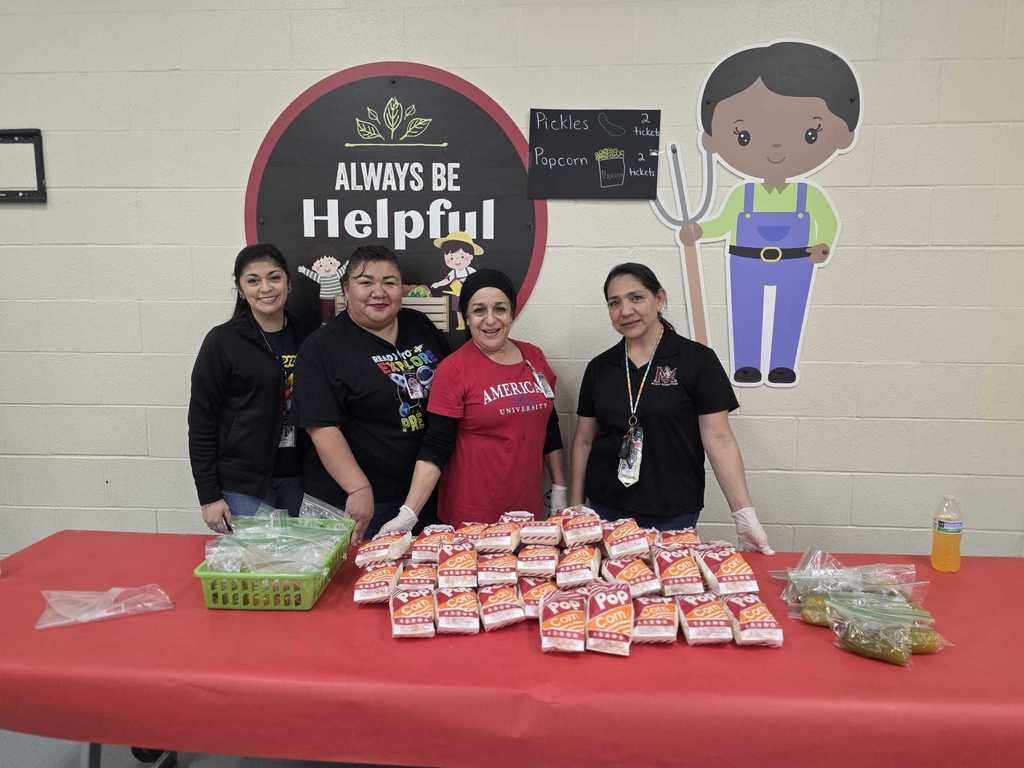 Teachers selling popcorn