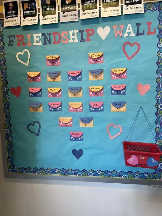A friendship wall with hearts and envelopes.