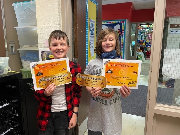 students holding certificates