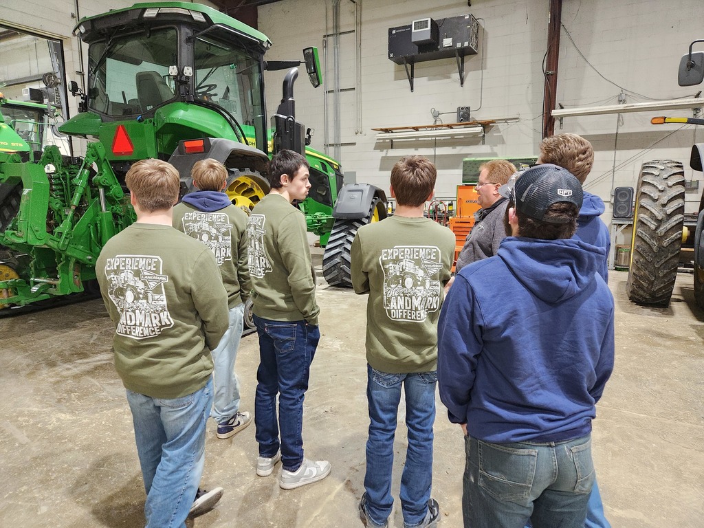 Landmark Implement tour where students were learning about the equipment that was in the shop
