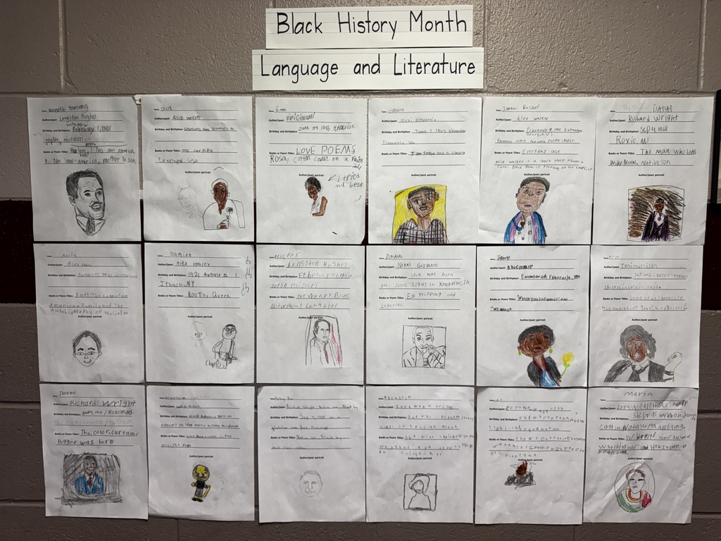 Paper on the wall with drawings and writing for Black History Month. 