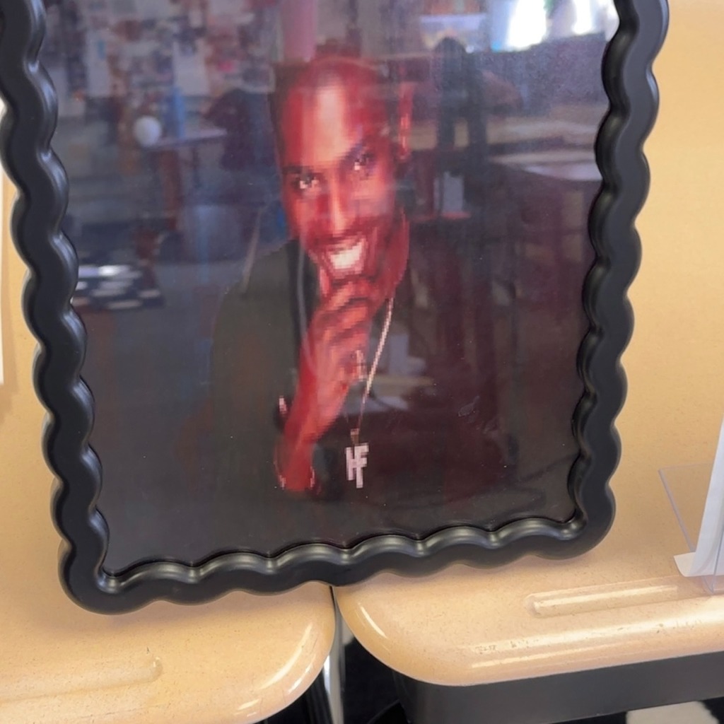 A photo of an individual in a black shirt .