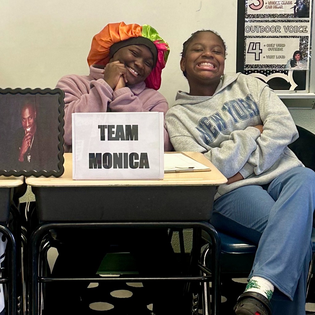 Two young girls that are Team Monica.