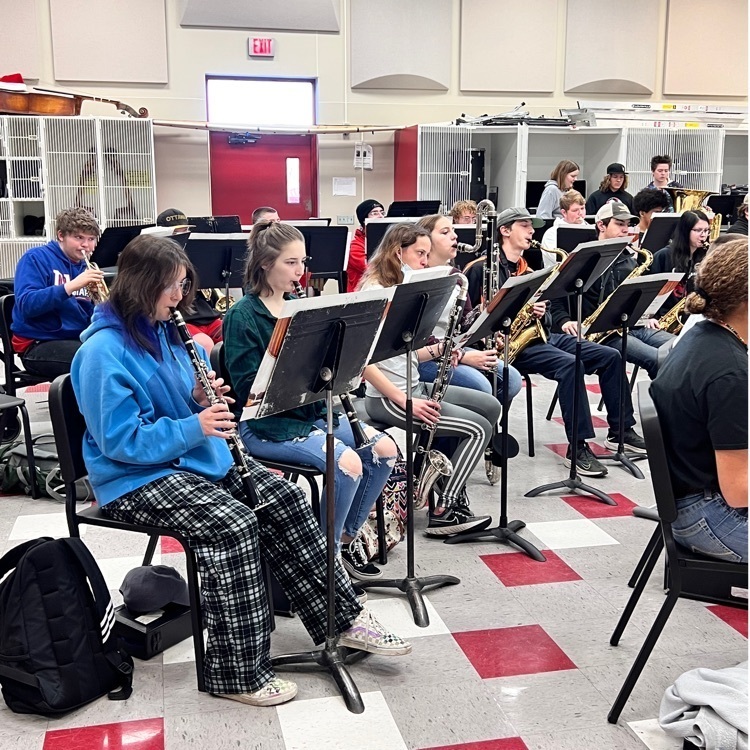 students playing band instruments 