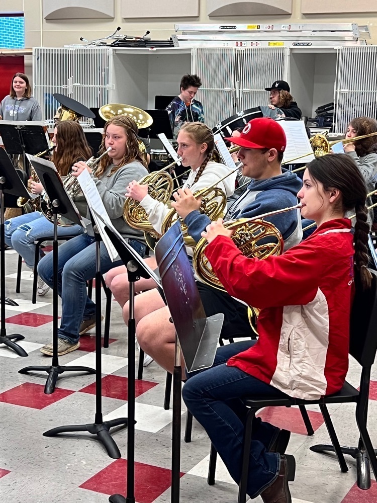 students playing band instruments 