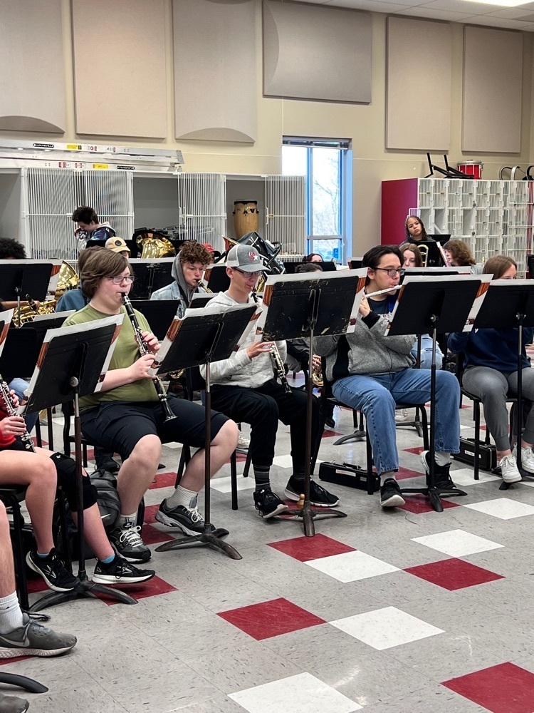 students playing band instruments 