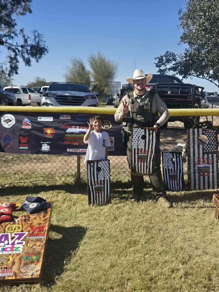 🎉 Bobcat, Cayden Perez, and his partner, Deputy Adler, came in 3rd place during the Kidz and Heroes Cornhole Tournament. Congratulations! 👏🏼